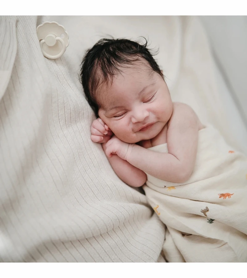 Mushie Organic Cotton Muslin Swaddle Blanket - Dinosaurs 3 Mushie Organic Cotton Muslin Swaddle Blanket - Dinosaurs - Image 3