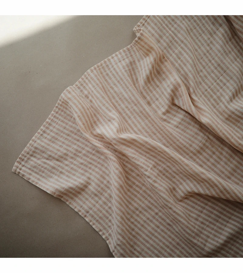 Mushie Organic Cotton Muslin Swaddle Blanket - Natural Stripe 2 Mushie Organic Cotton Muslin Swaddle Blanket - Natural Stripe - Image 2