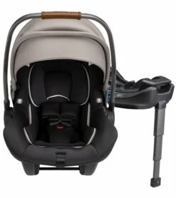 Nuna PIPA Lite R Lightweight Infant Car Seat + RELX Base With Load Leg - Timber