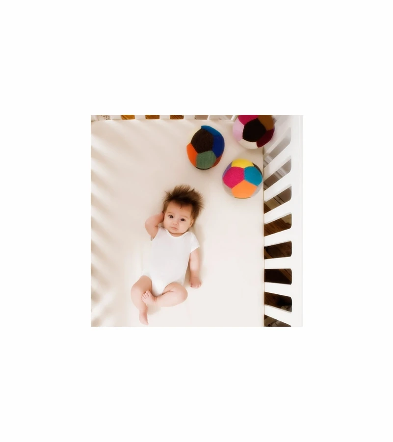 Oeuf Pure & Simple Natural Dual Firm Crib Mattress 3 Oeuf Pure & Simple Natural Dual Firm Crib Mattress - Image 3